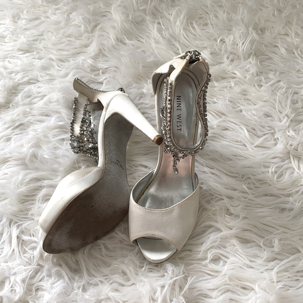 White heels. Nine West. Size 7